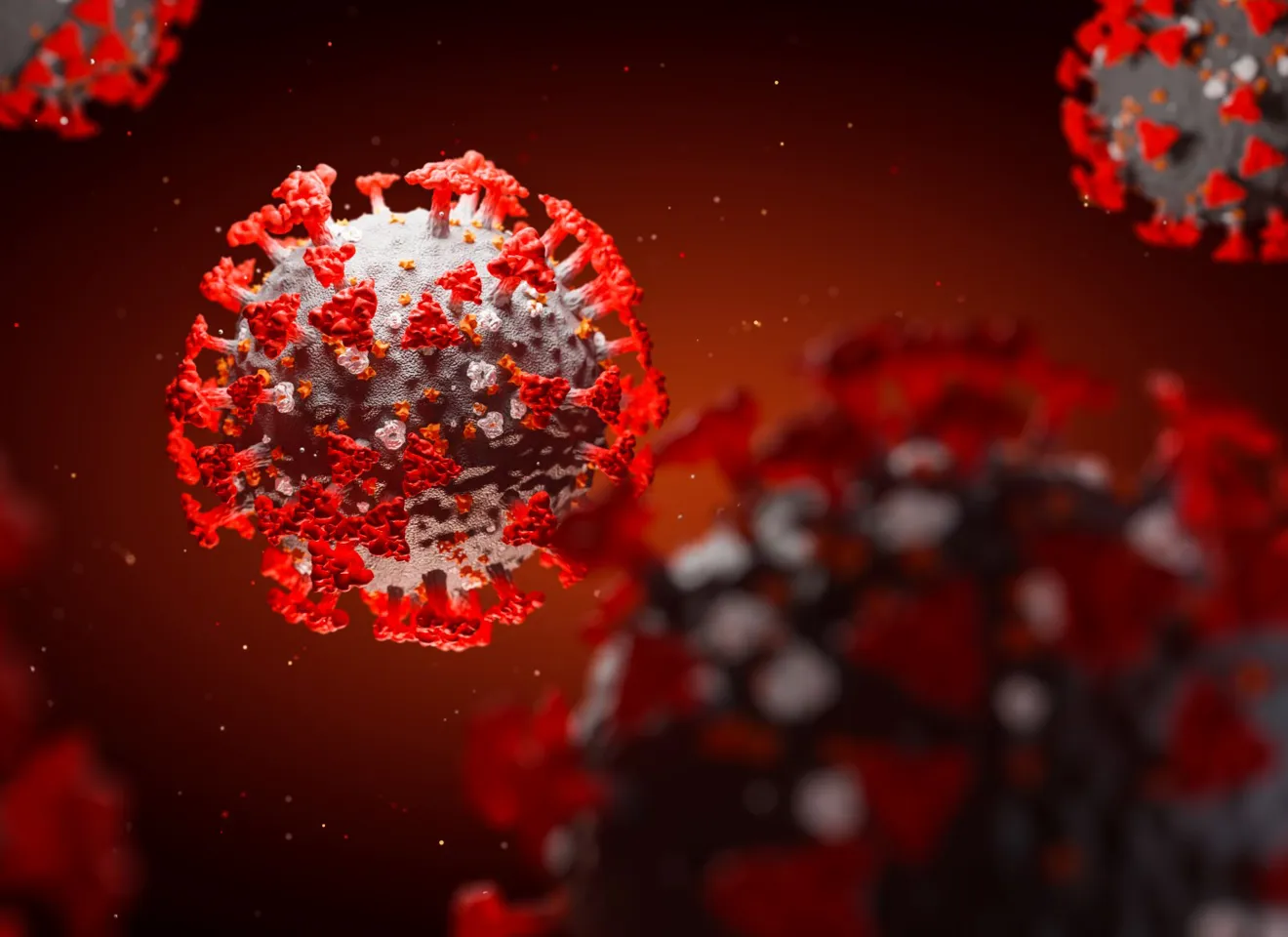 Illustrasjonsbilde av Koronaviruset som en grå kule med røde spiker stikkende ut