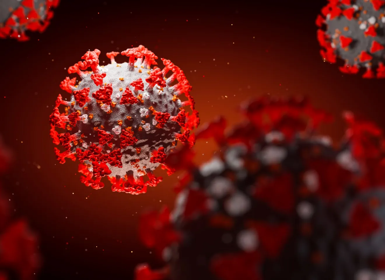 Illustrasjonsbilde av Koronaviruset som en grå kule med røde spiker stikkende ut