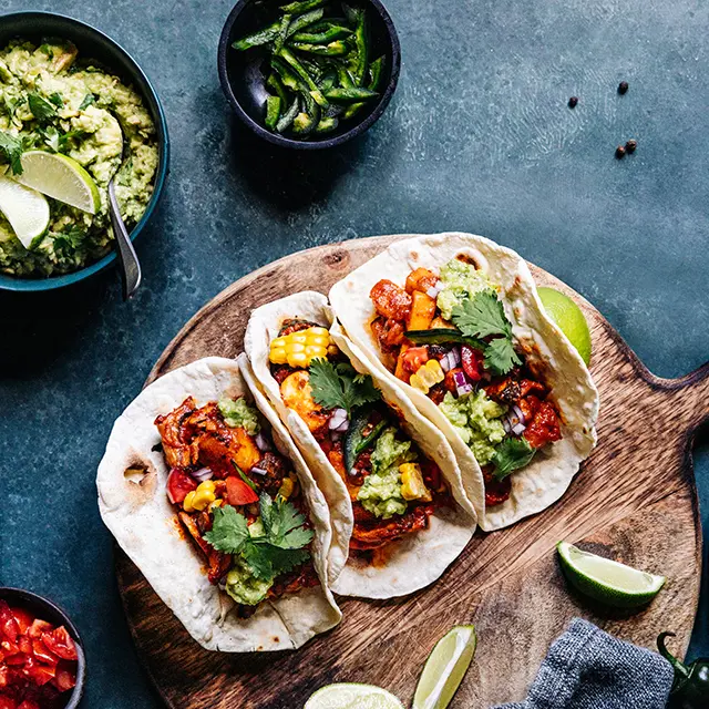 Tre tacolefser som er fylt med god mat