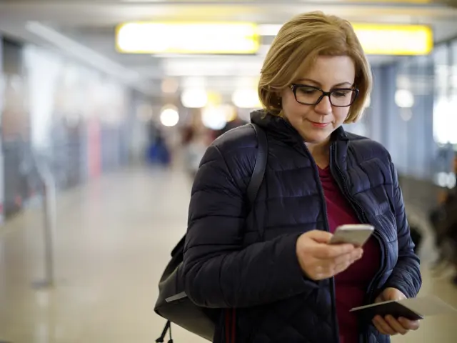 kvinne på arbeidsreise