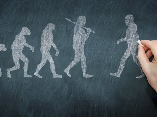 Illustrasjonsbilde av en hånd som tegner på tavle