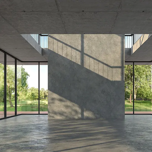 Betongvegg med grønne omgivelser