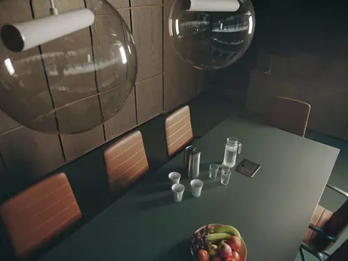 Bilde av et tomt bord med stoler rundt i et møterom. Kaffekanne og vann og frukt står på bordet. 