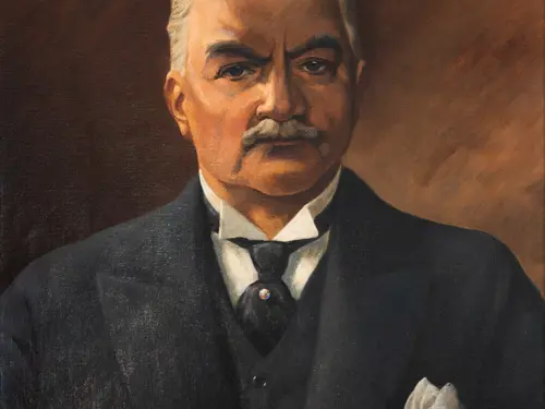 Et brunlig maleri av en middelaldrende mann med grått hår og bart