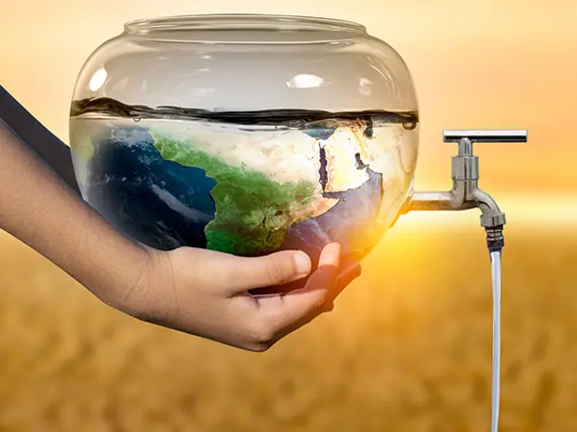 Vannkran på en glassbolle