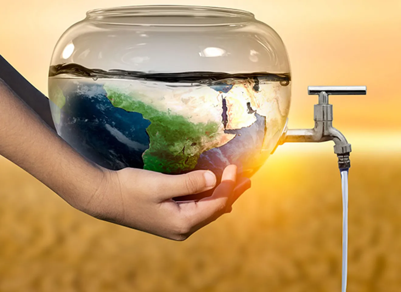 Vannkran på en glassbolle